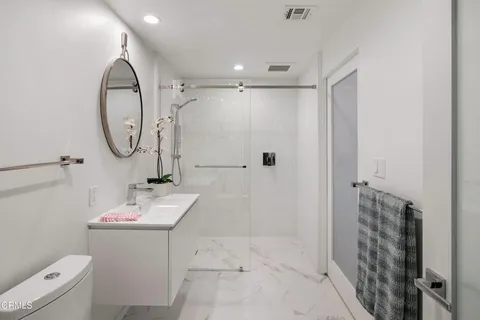 a bathroom with a bathtub and shower curtain