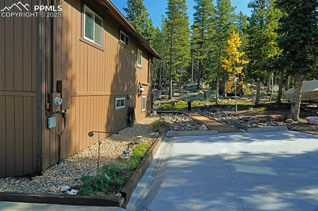 a backyard of a house with lots of green space