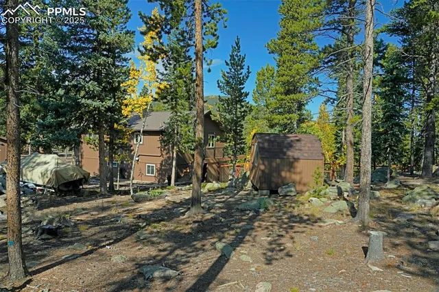 a backyard of a house with lots of green space