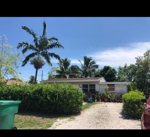6436 Southwest 22nd Street Miramar, FL 33023 - Photo 1 of 1 a view of a house with a garden