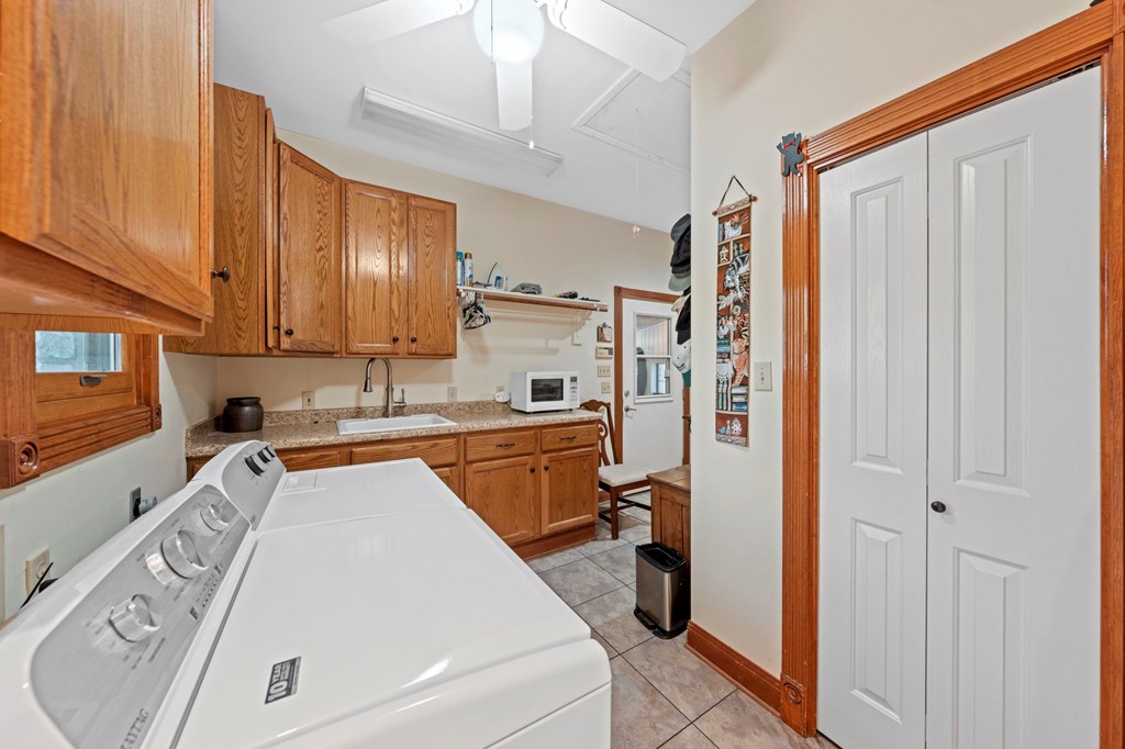 726 Paradise Ranch Road Fredericksburg, TX 78624 - Photo 23 of 38 a room with stainless steel appliances granite countertop a refrigerator and a sink