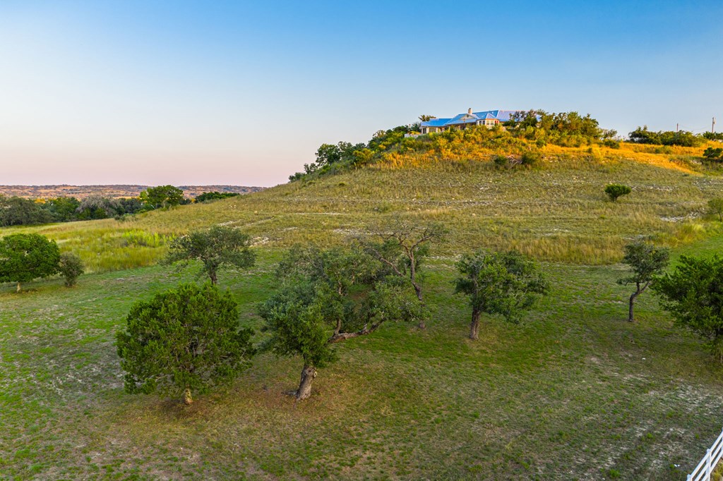 726 Paradise Ranch Road Fredericksburg, TX 78624 - Photo 31 of 38 a view of a lake