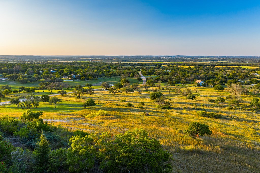 726 Paradise Ranch Road Fredericksburg, TX 78624 - Photo 35 of 38 a view of an ocean and beach
