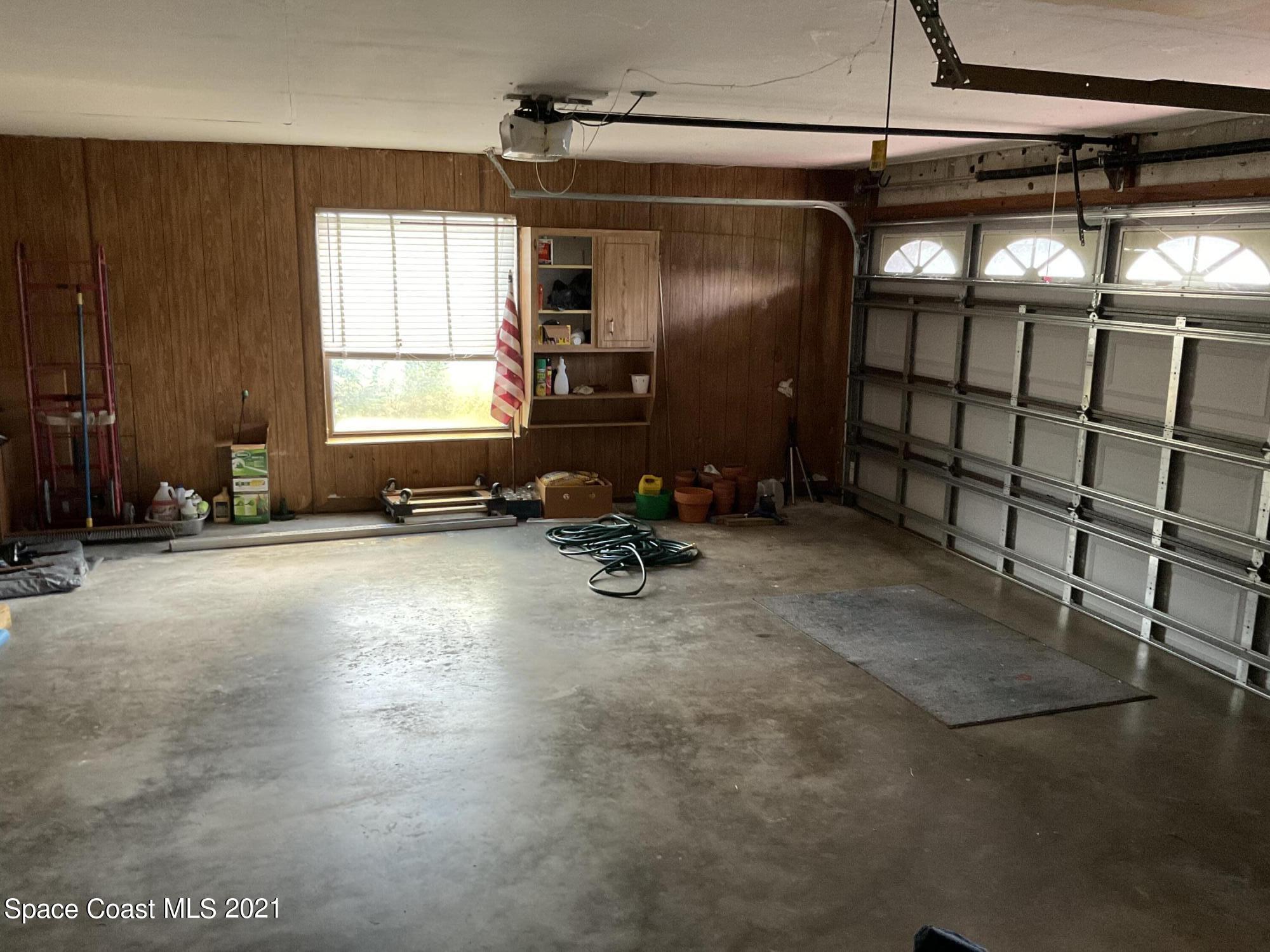 2580 Tammy Drive Mims, FL 32754 - Photo 14 of 47 a view of a room with gym equipment