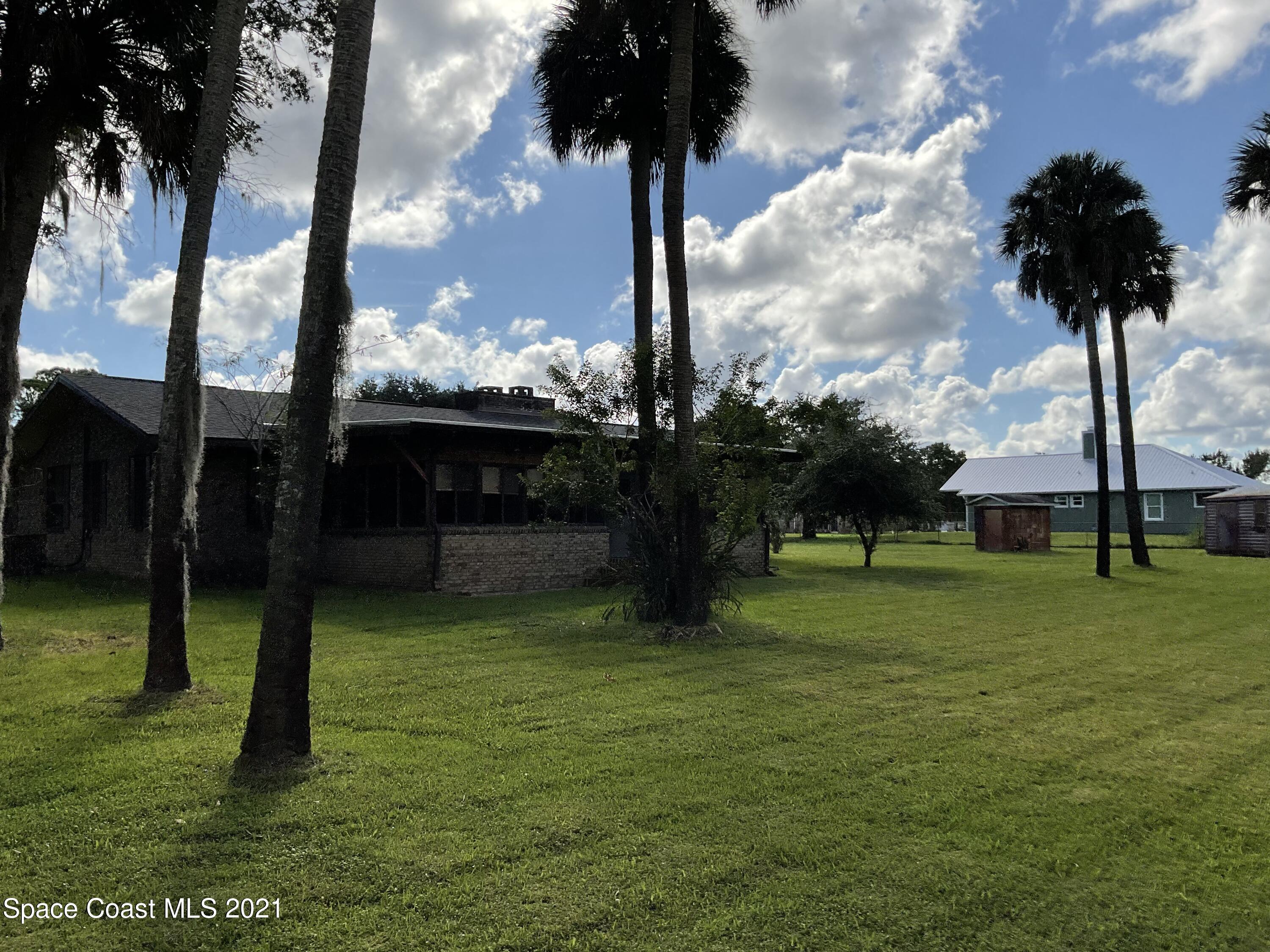 2580 Tammy Drive Mims, FL 32754 - Photo 44 of 47 a view of a garden