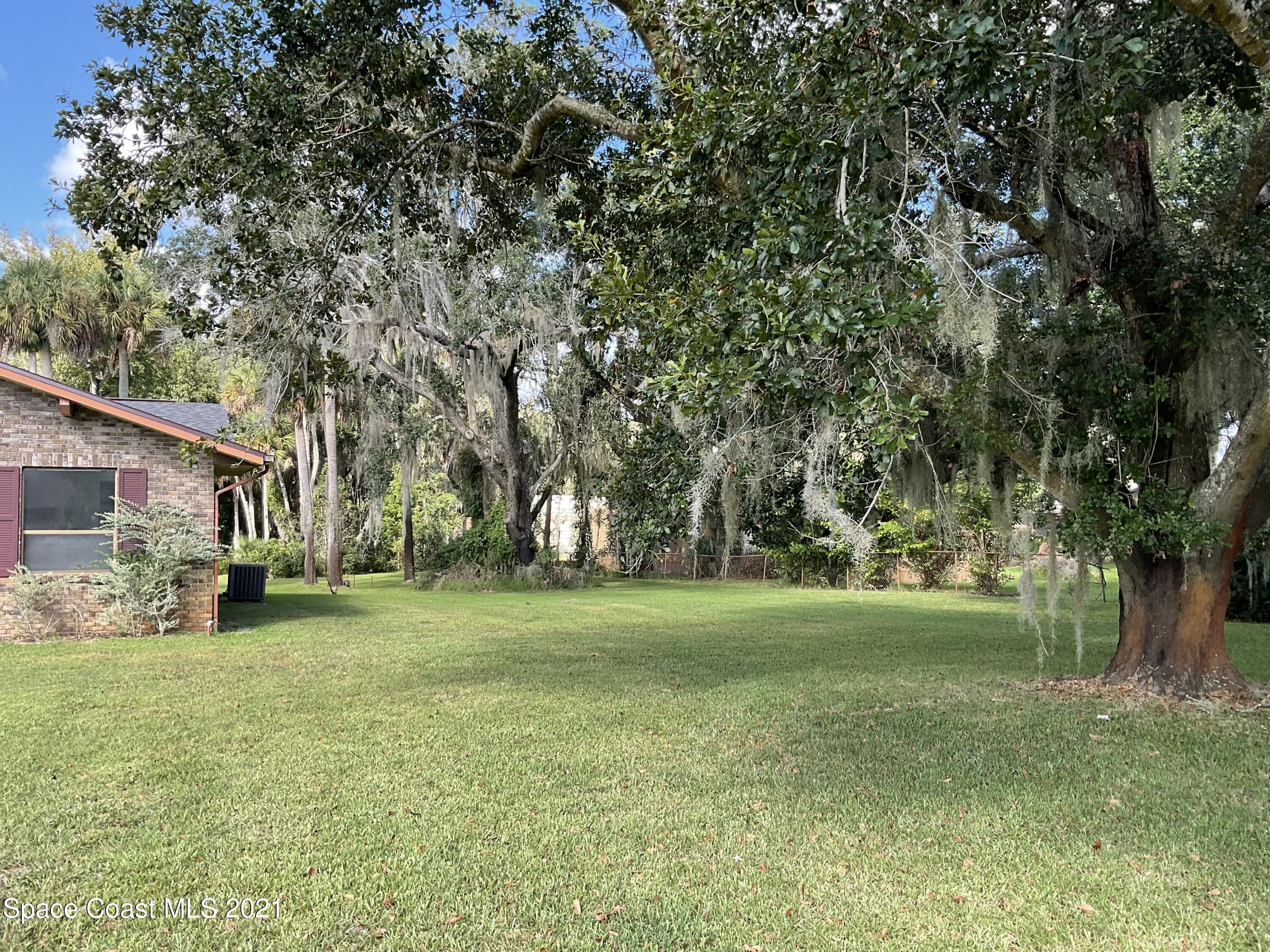 2580 Tammy Drive Mims, FL 32754 - Photo 46 of 47 a view of a yard with a house