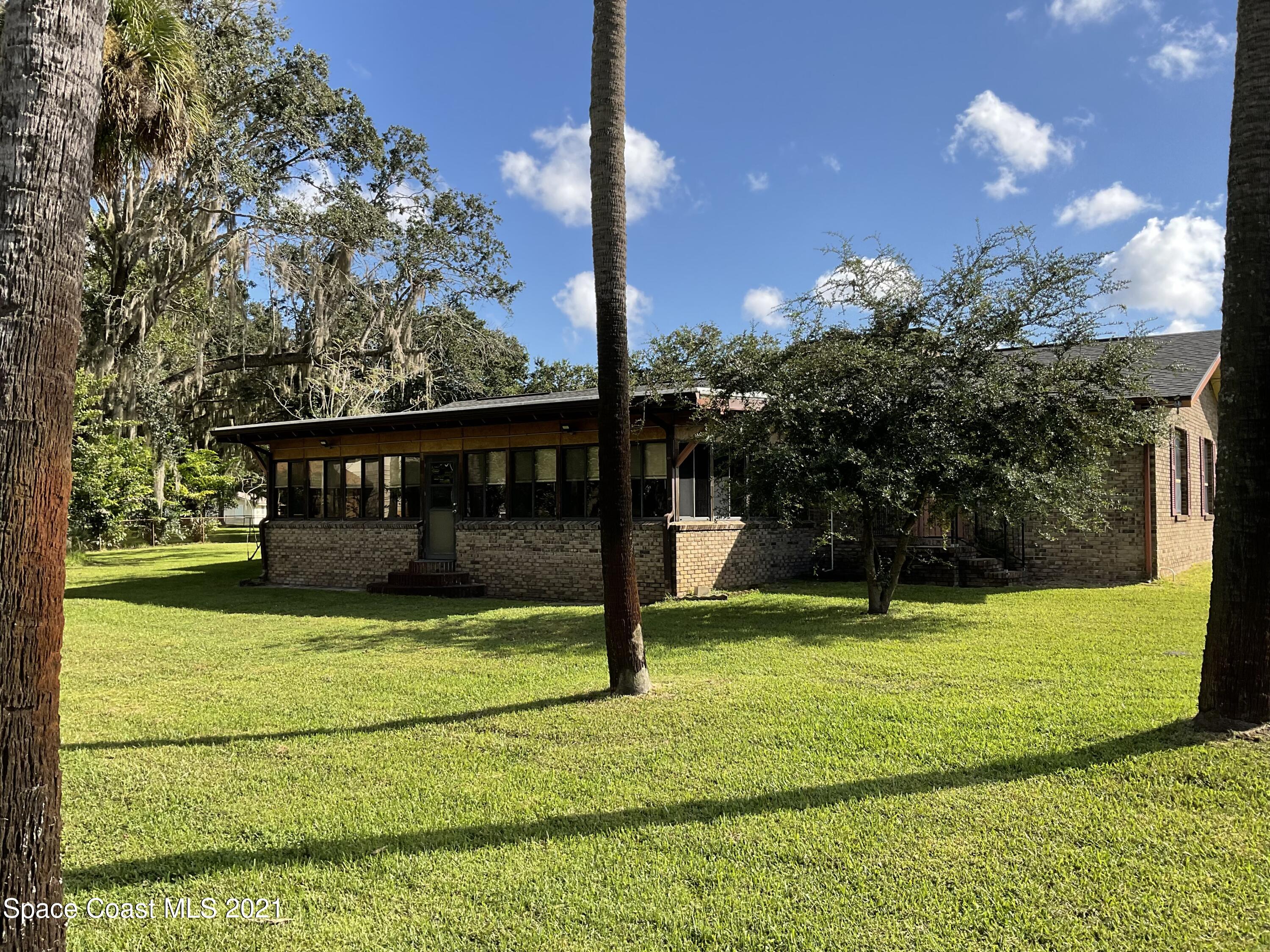 2580 Tammy Drive Mims, FL 32754 - Photo 9 of 47 a view of a house with a yard