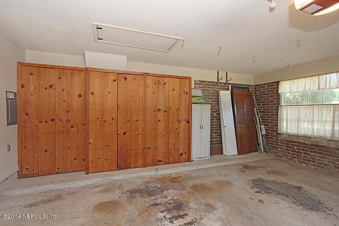 117 Vanderford Road North Orange Park, FL 32073 - Photo 22 of 23 Garage storage