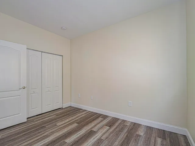 a view of a room that has a window in it