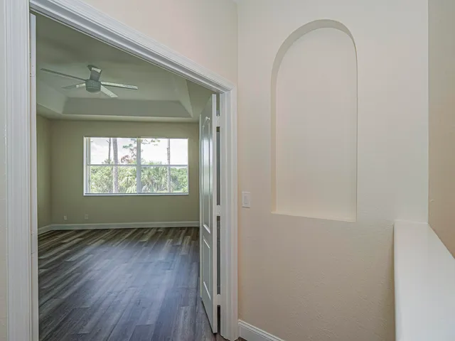 a view of a room with racks on the wall