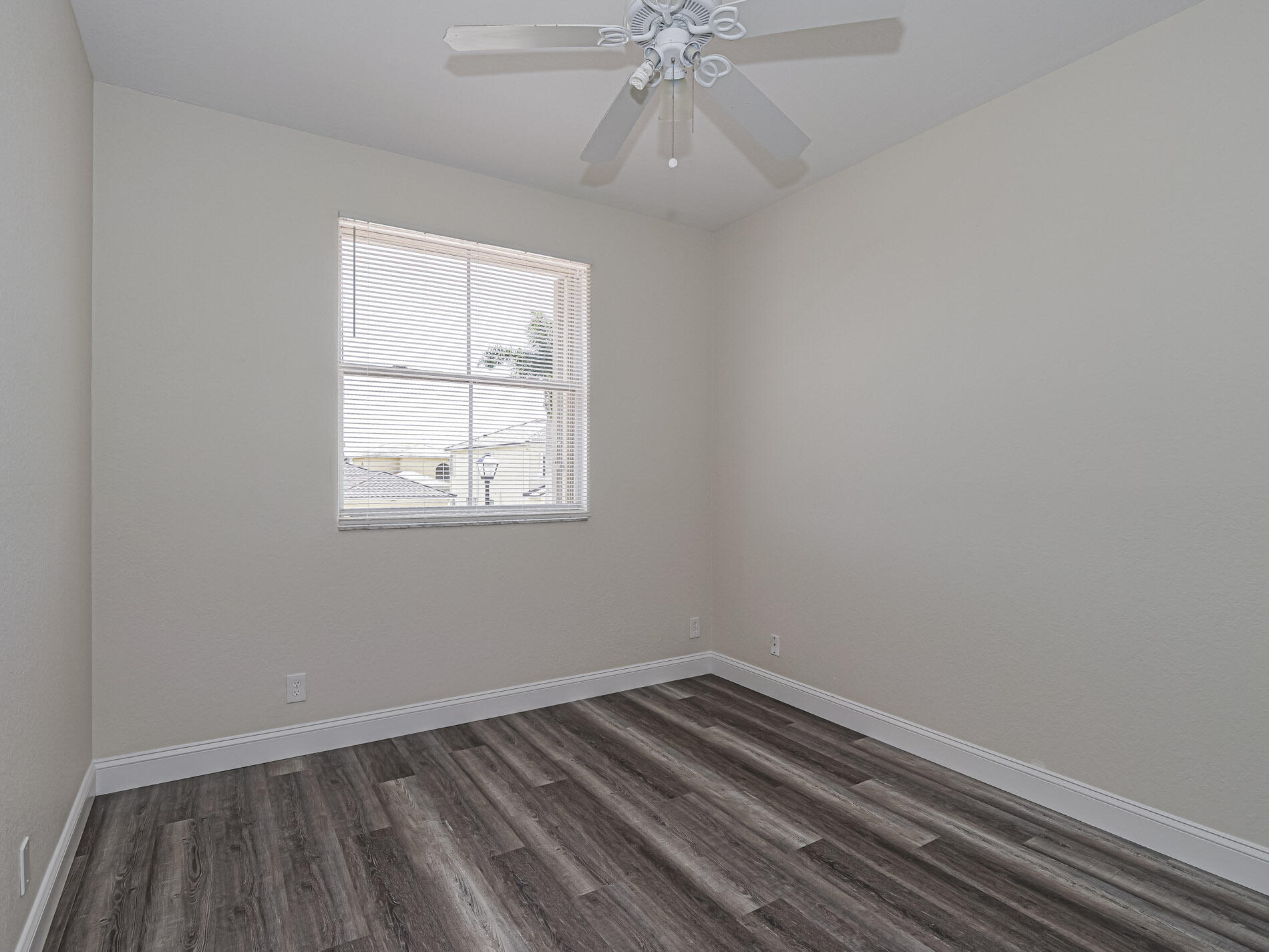 5605 Spanish River Road Fort Pierce, FL 34951 - Photo 33 of 40 an empty room with a window