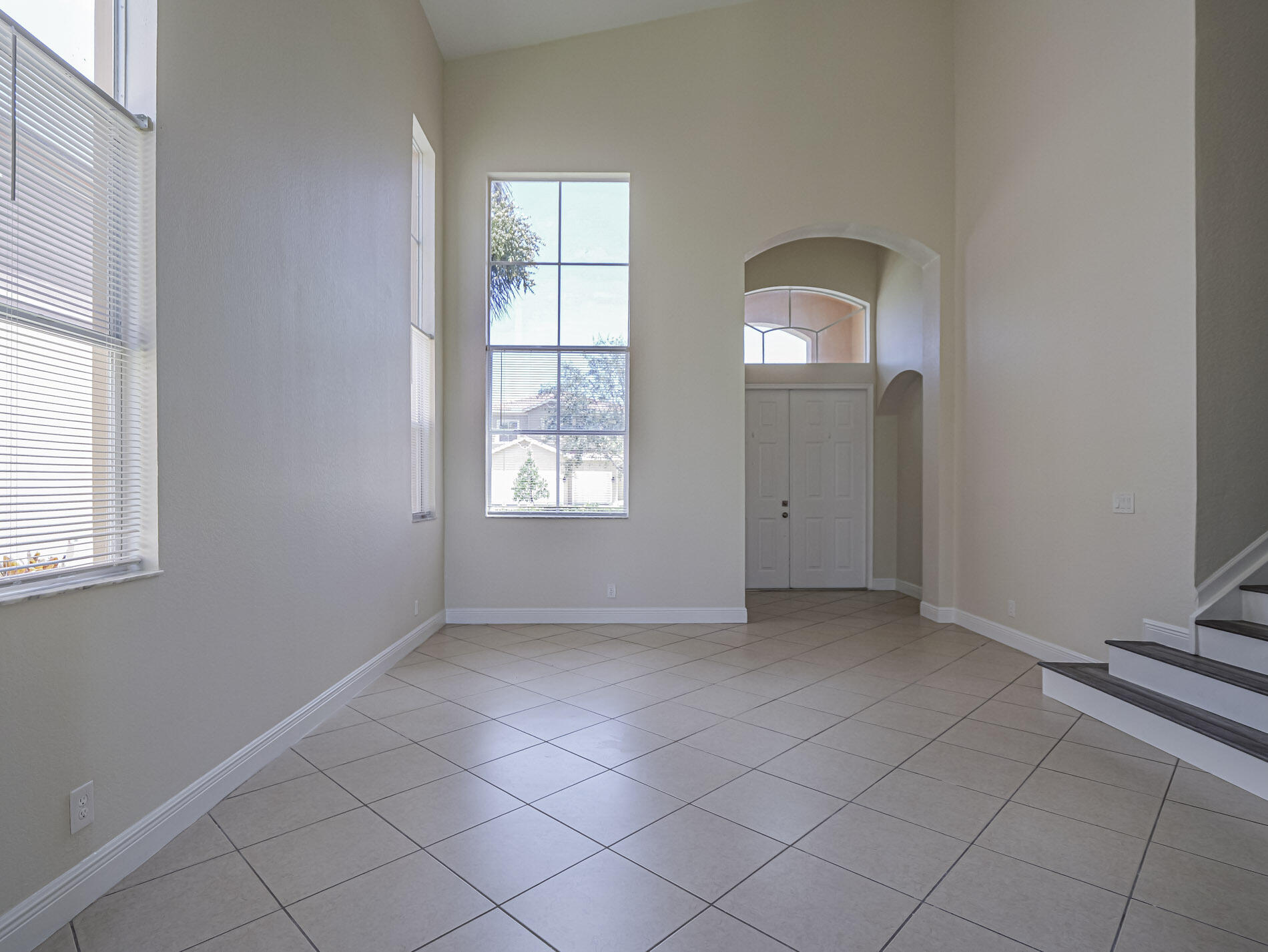 5605 Spanish River Road Fort Pierce, FL 34951 - Photo 8 of 40 an empty room with windows