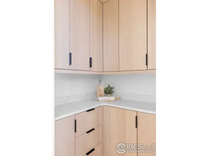 a kitchen with a white cabinets