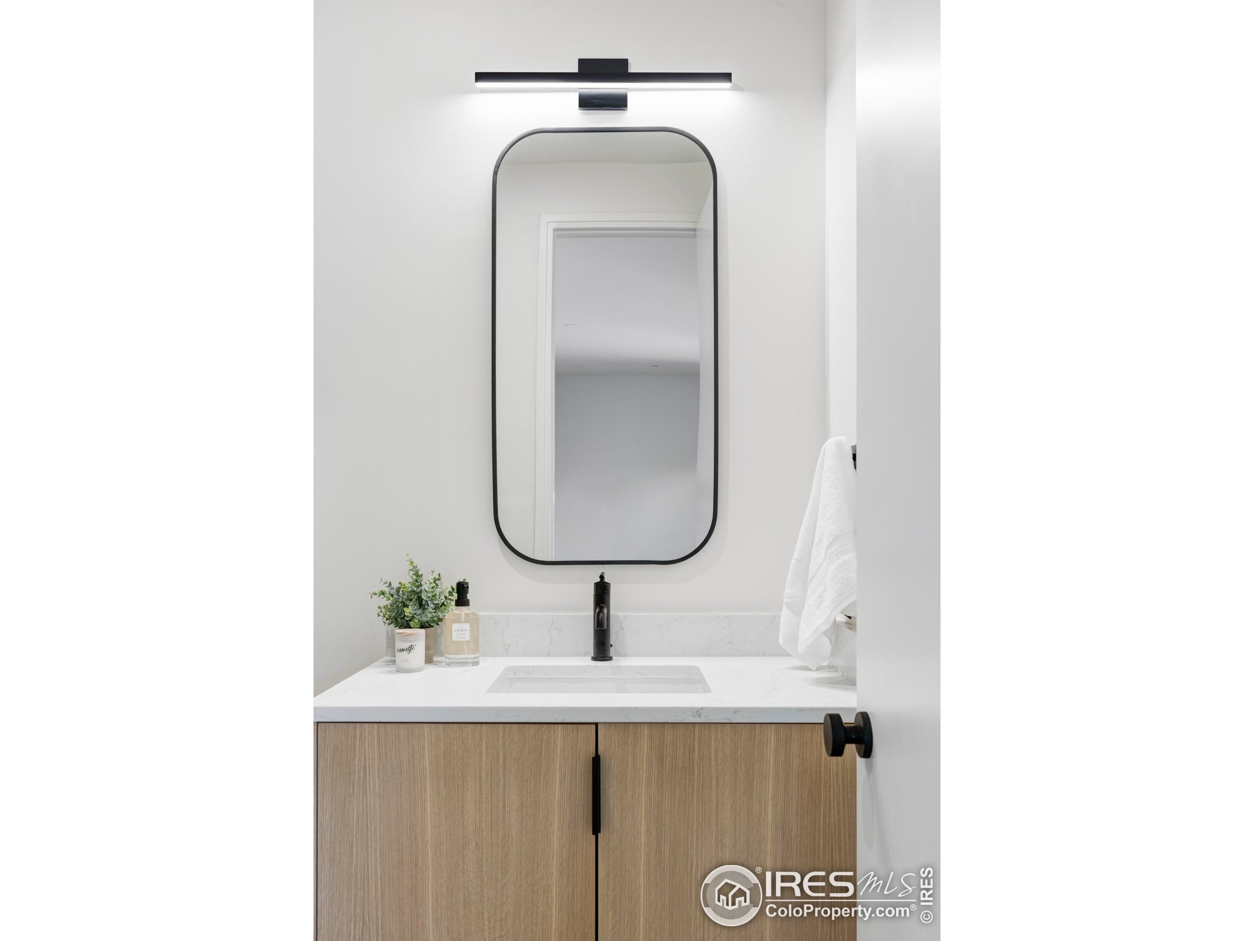 1575 Linden Drive Boulder, CO 80304 - Photo 30 of 39 a bathroom with a sink and a mirror