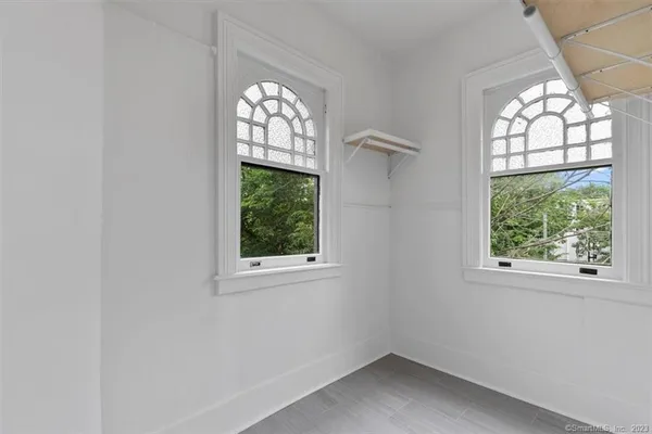 an empty room with windows