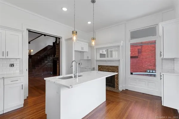 a spacious bathroom with a sink double vanity and a mirror