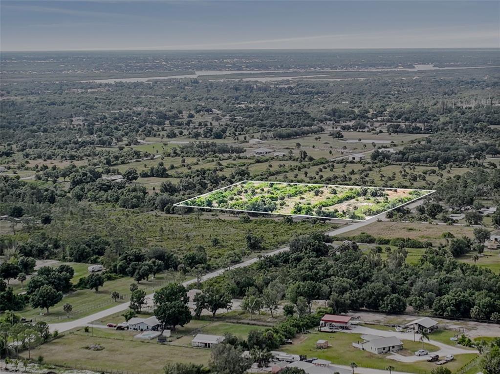 6227 Grove Boulevard Punta Gorda, FL 33982 - Photo 2 of 8 a view of a lake view