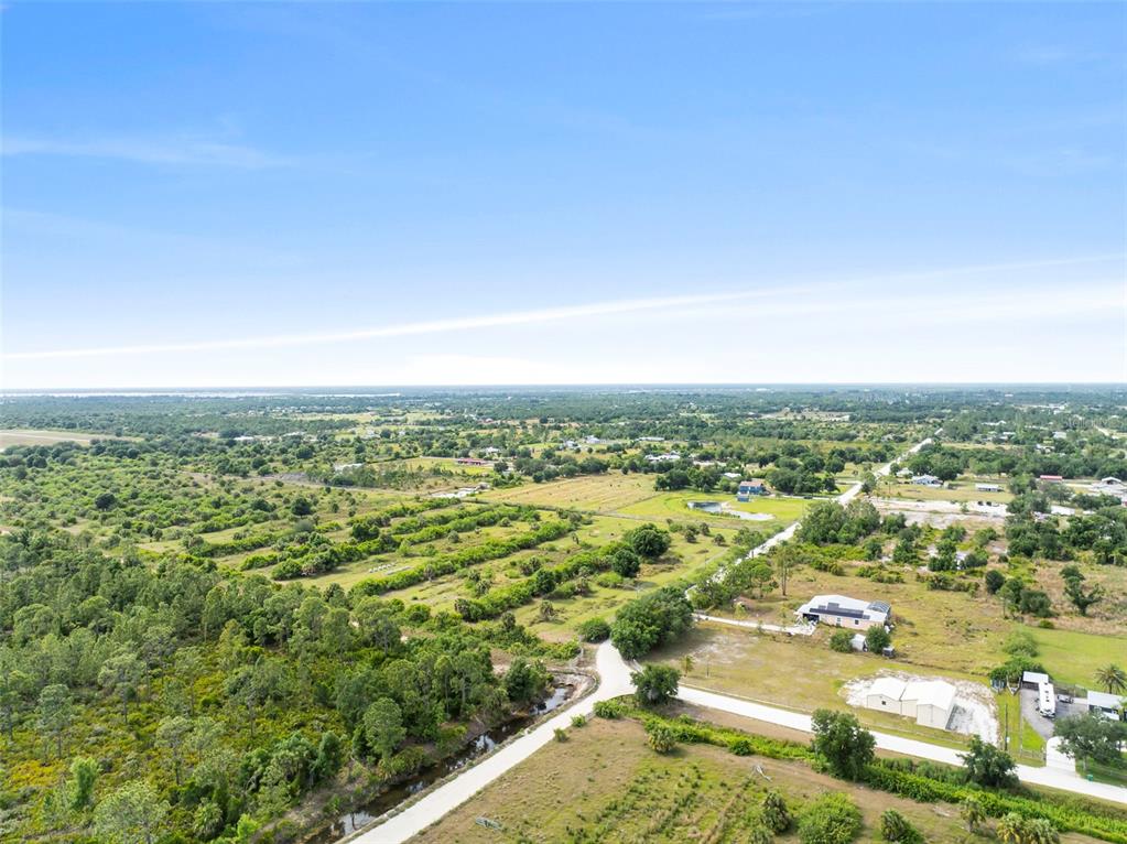 6227 Grove Boulevard Punta Gorda, FL 33982 - Photo 7 of 8 an aerial view of residential houses with city view