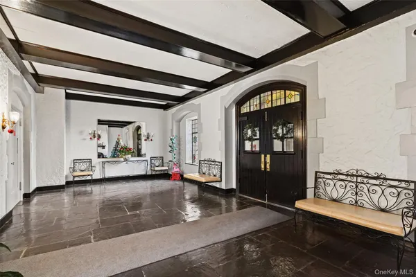 a view of a livingroom with furniture and window