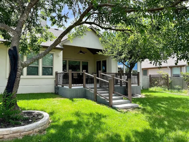 a view of a porch with furniture