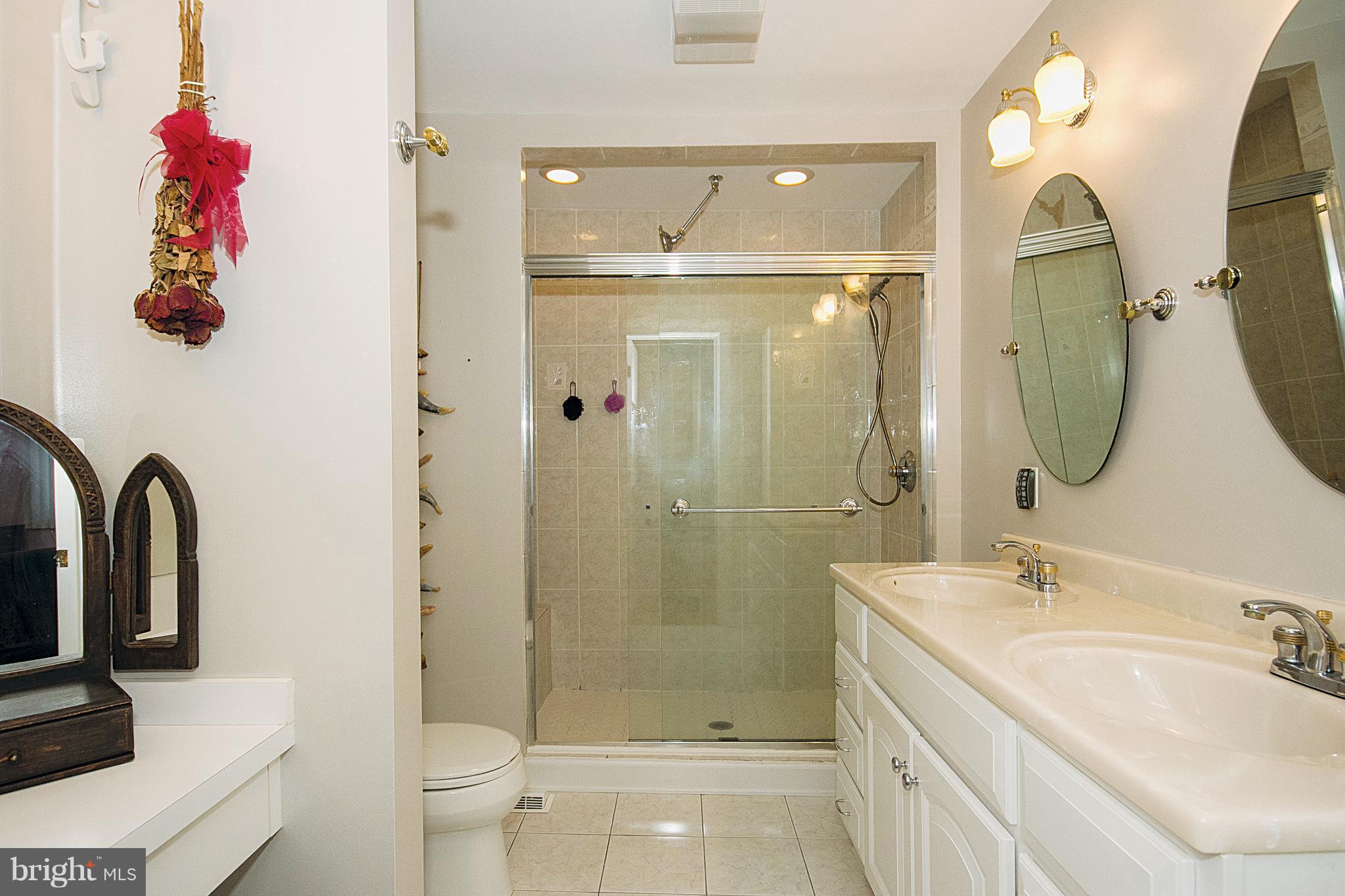 1820 Greenberry Road Baltimore, MD 21209 - Photo 18 of 30 Double sinks and a dressing table