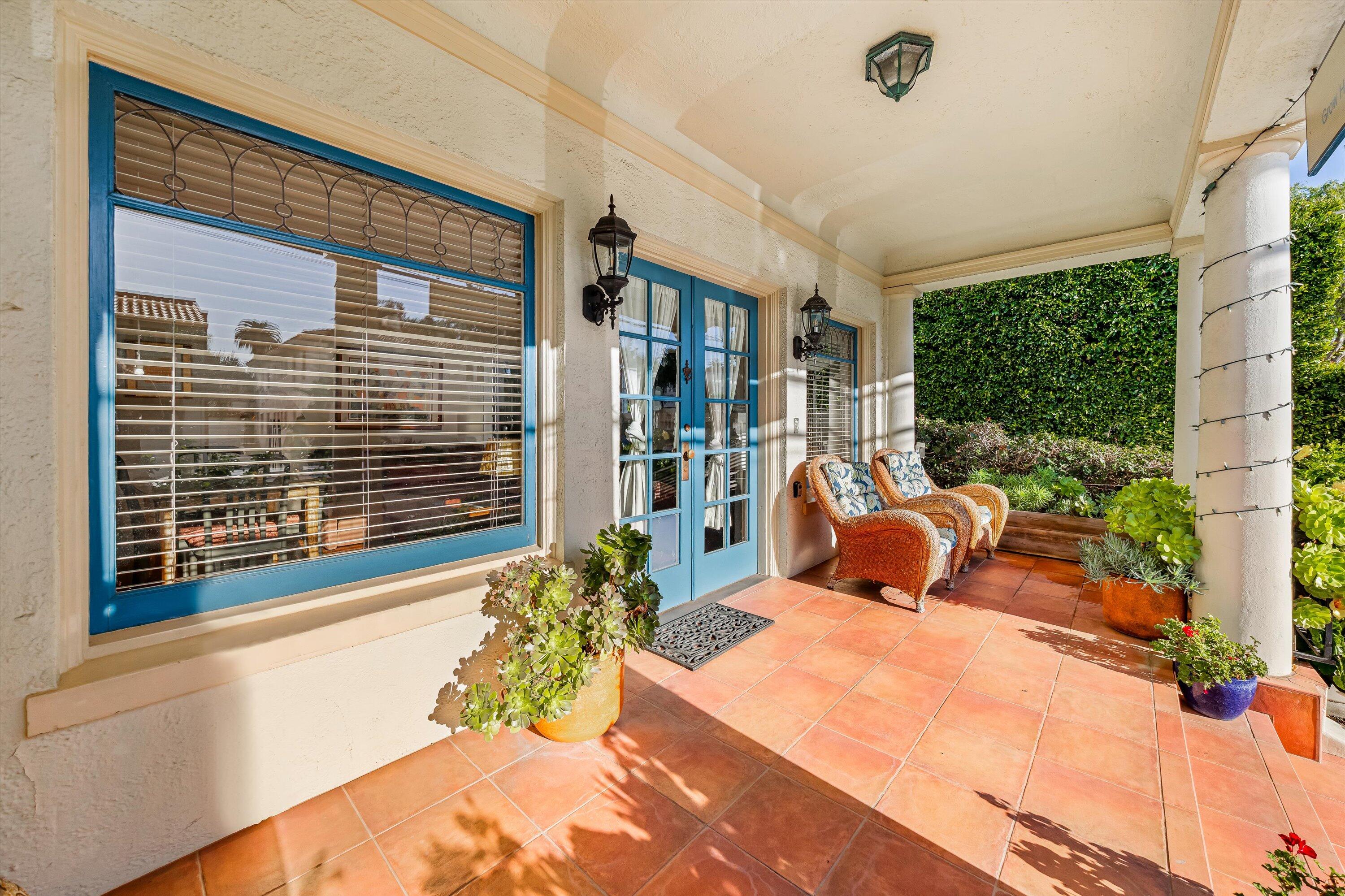 118 Chapala Street Santa Barbara, CA 93101 - Photo 13 of 46 a bed room with two large bed and a large window