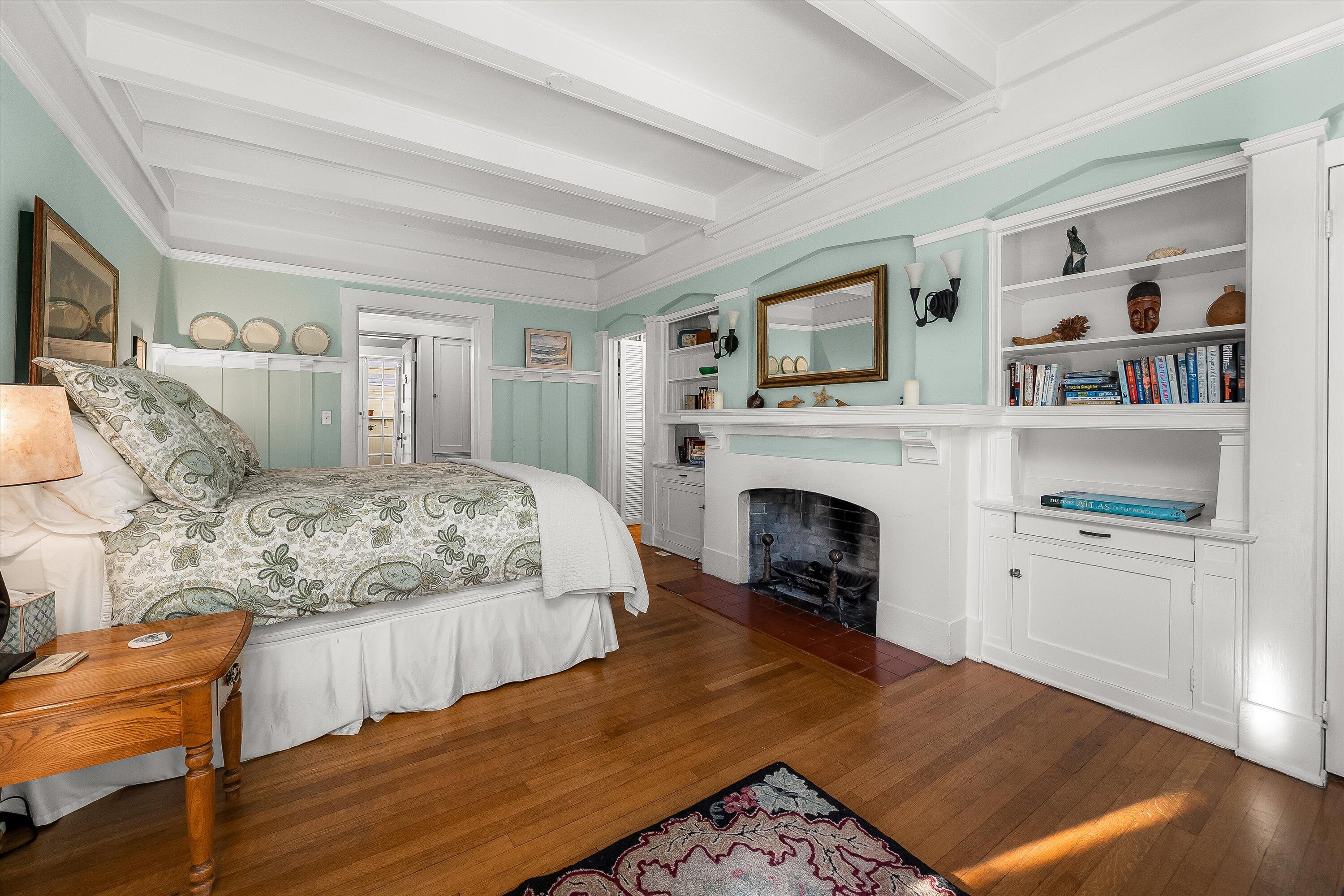 118 Chapala Street Santa Barbara, CA 93101 - Photo 16 of 46 a bedroom with a bed and a fireplace