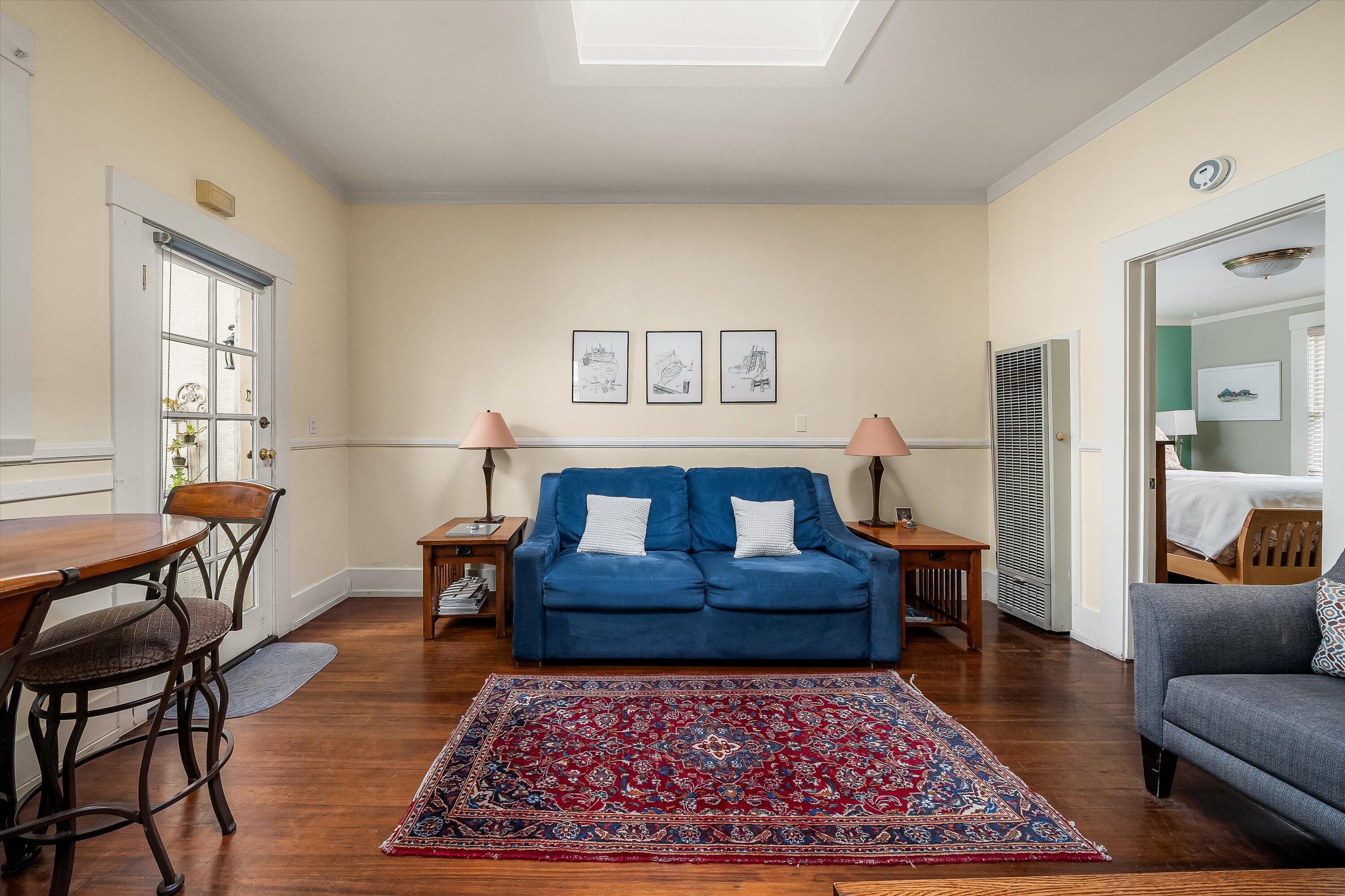 118 Chapala Street Santa Barbara, CA 93101 - Photo 21 of 46 a living room with furniture and a rug