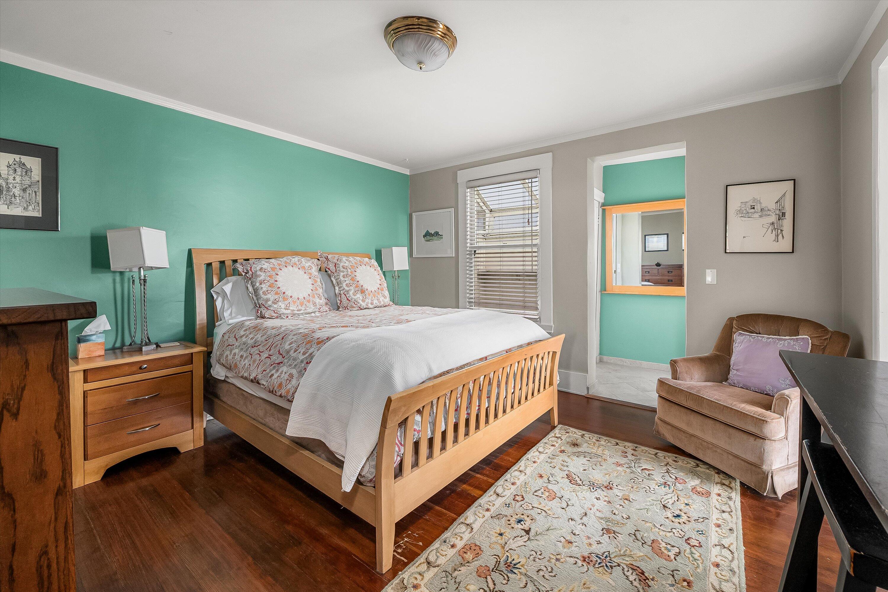 118 Chapala Street Santa Barbara, CA 93101 - Photo 23 of 46 a bed room with a bed and a couch