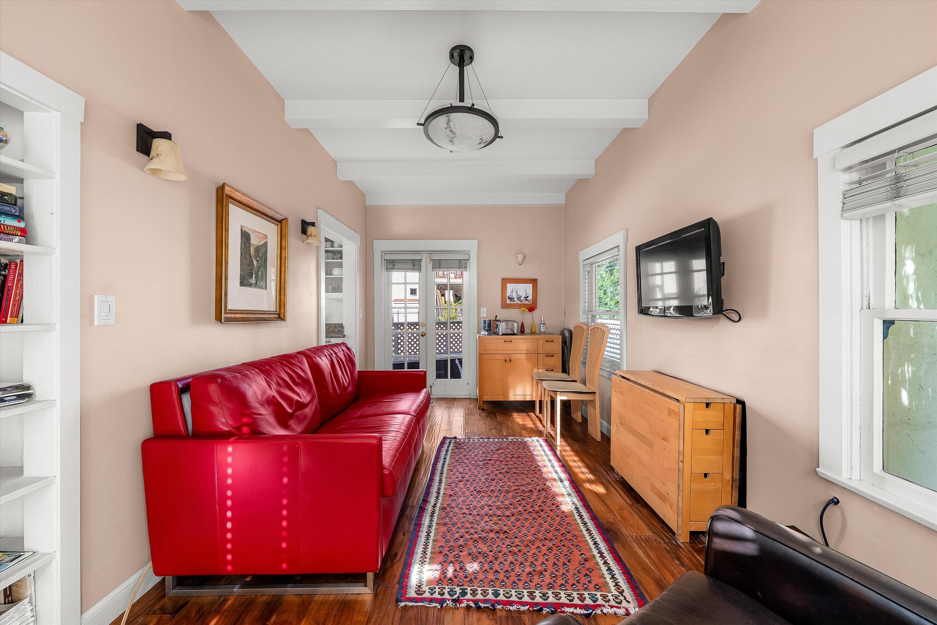 118 Chapala Street Santa Barbara, CA 93101 - Photo 25 of 46 a living room with furniture and a flat screen tv