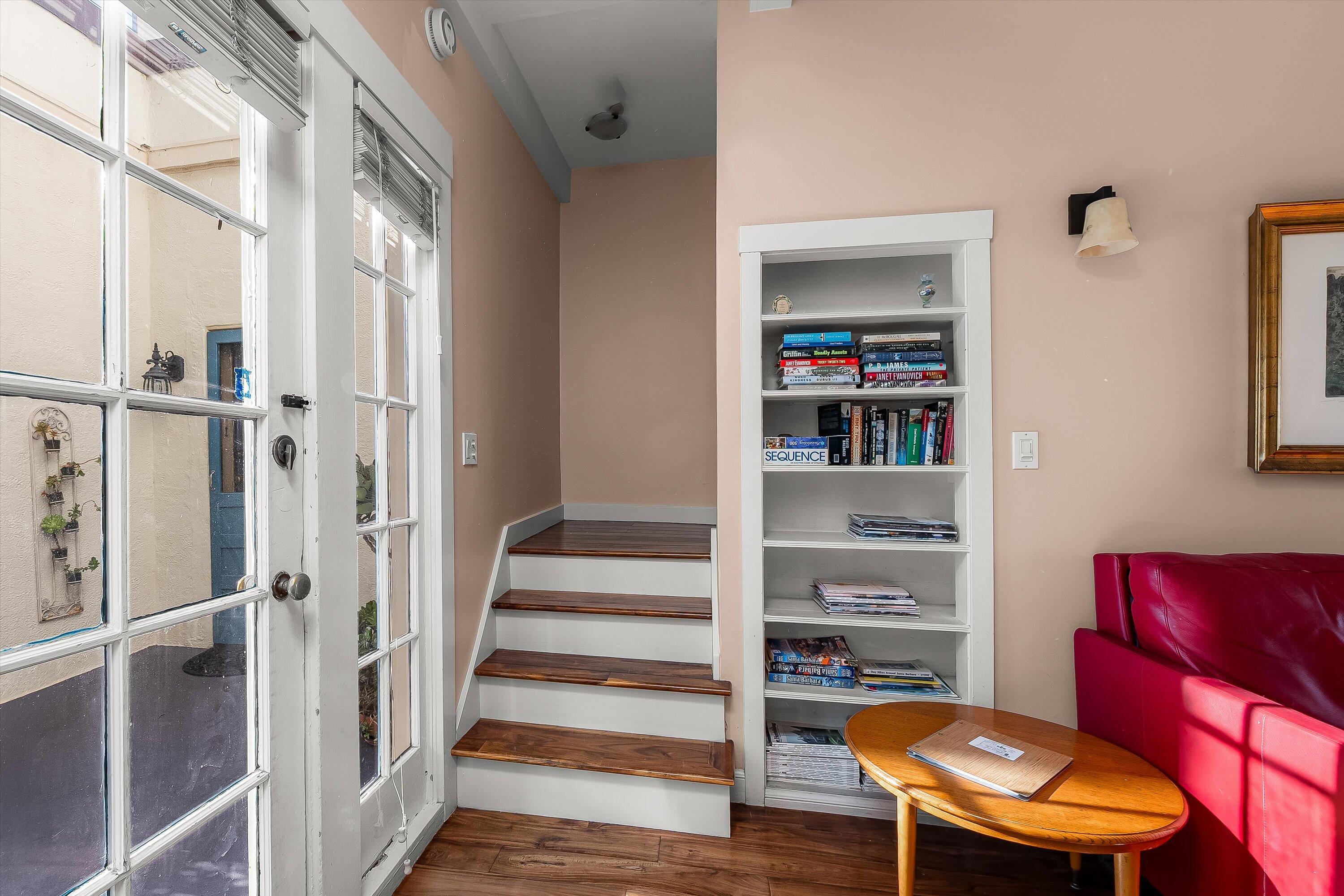 118 Chapala Street Santa Barbara, CA 93101 - Photo 28 of 46 a room with wooden floor and furniture