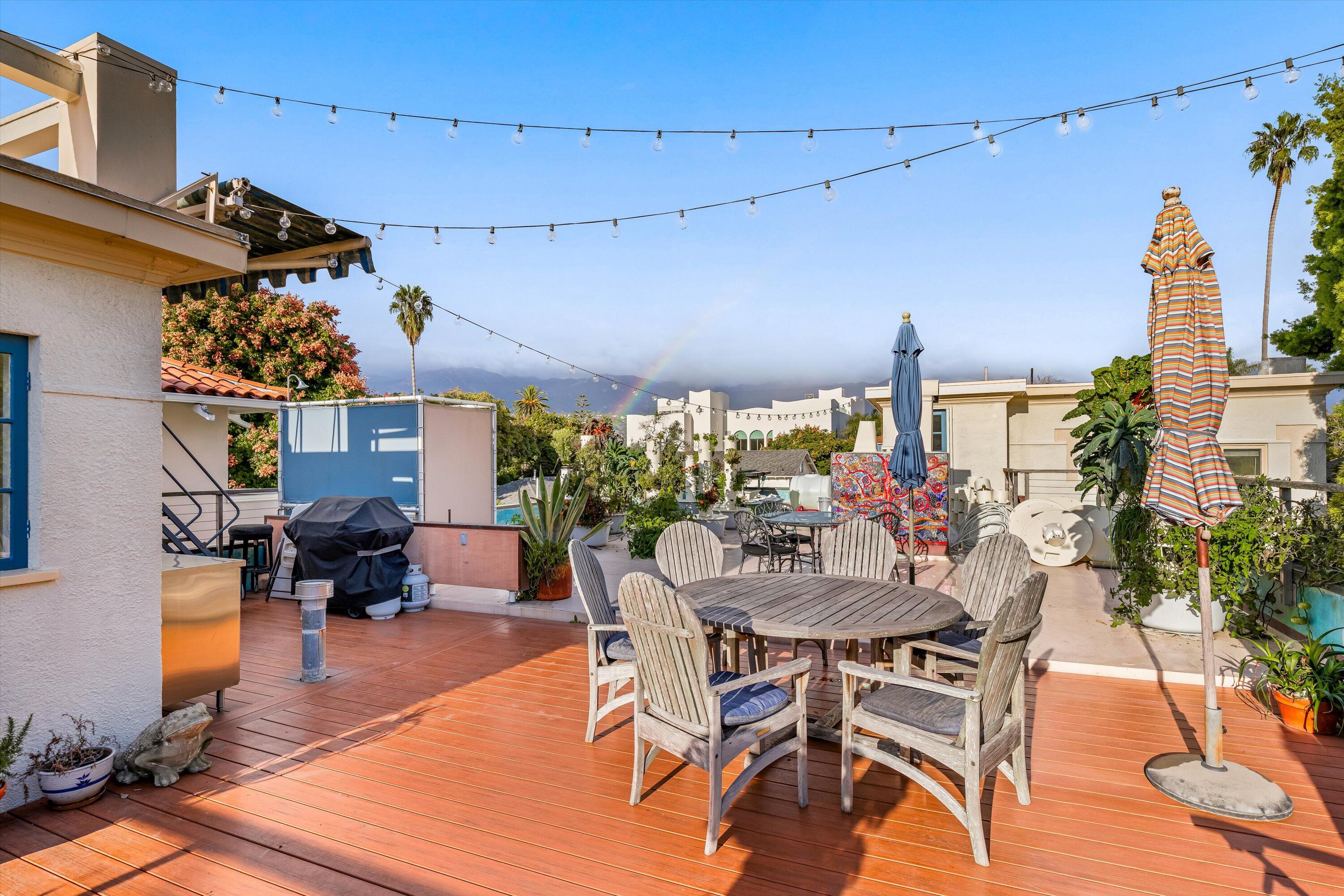 118 Chapala Street Santa Barbara, CA 93101 - Photo 8 of 46 a view of a dining room with furniture and wooden floor