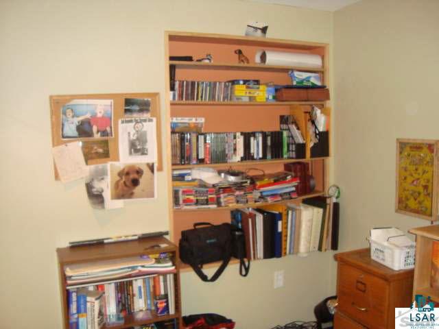 6670 County Rd F Lake Nebagamon, WI 54849 - Photo 16 of 25 Built-in shelving in Office