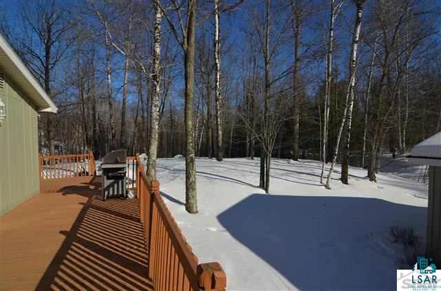 6670 County Rd F Lake Nebagamon, WI 54849 - Photo 24 of 25 Deck & yard by garage area