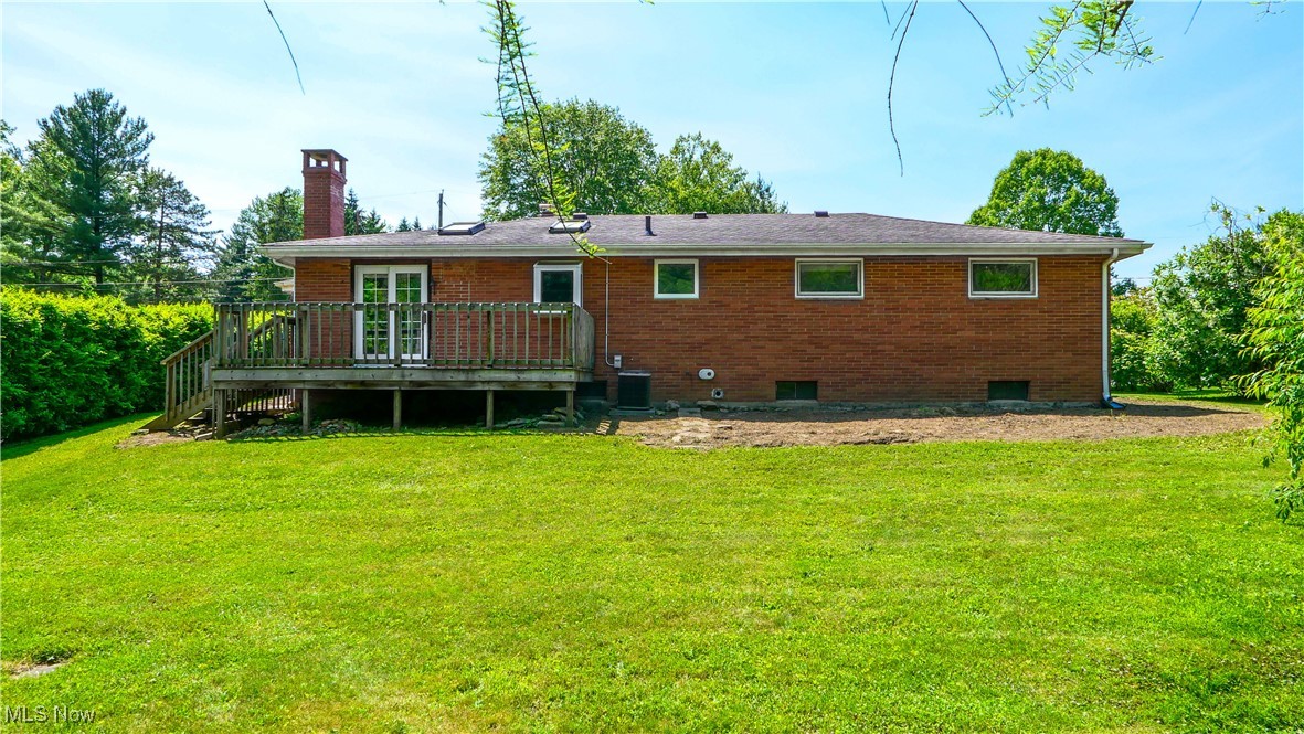 11828 Sheldon Road Mantua, OH 44255 - Photo 2 of 31 Back view of home featuring a wooden deck