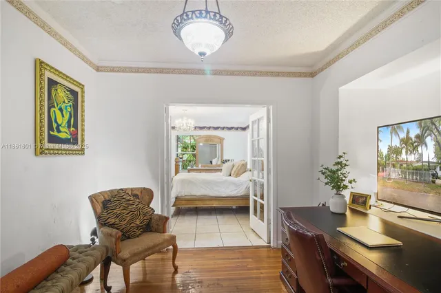 a bedroom with furniture and a bed