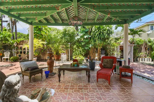 a outdoor living space with furniture and garden view