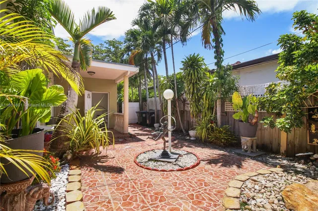 a vase of flowers sitting on a table
