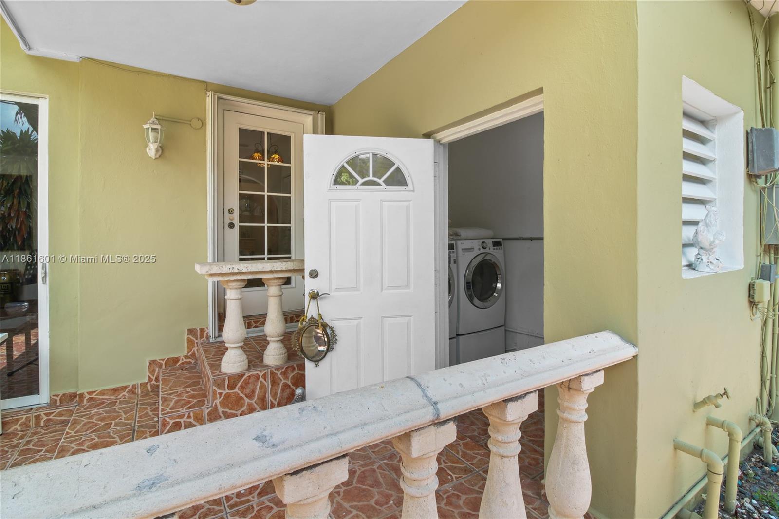 6101 Southwest 13th Terrace West Miami, FL 33144 - Photo 40 of 47 a view of front door of house