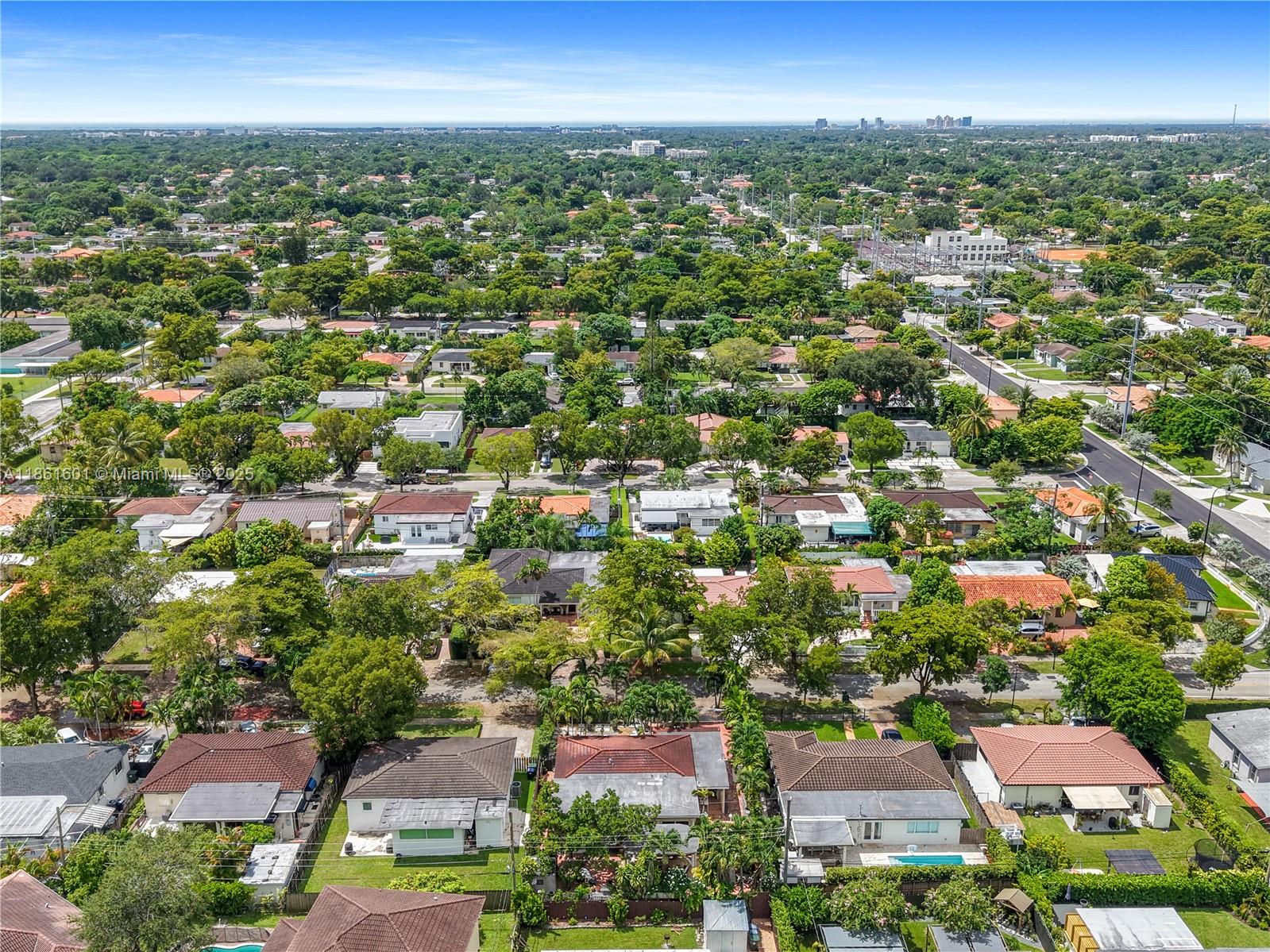 6101 Southwest 13th Terrace West Miami, FL 33144 - Photo 43 of 47 an aerial view of residential houses with city view