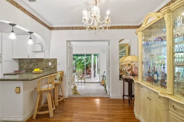 a view of a kitchen and dining room