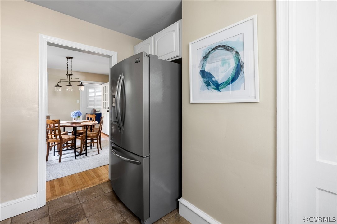 1003 Bevridge Road Richmond, VA 23226 - Photo 11 of 29 a kitchen with stainless steel appliances granite countertop a refrigerator and a stove top oven