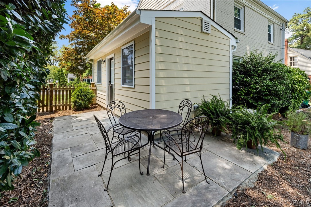 1003 Bevridge Road Richmond, VA 23226 - Photo 23 of 29 a backyard of a house with table and chairs