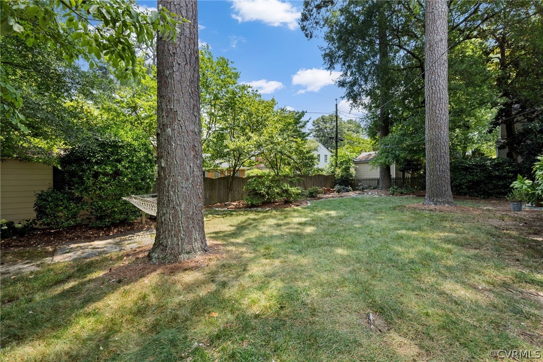 1003 Bevridge Road Richmond, VA 23226 - Photo 26 of 29 a view of a yard with plants and trees