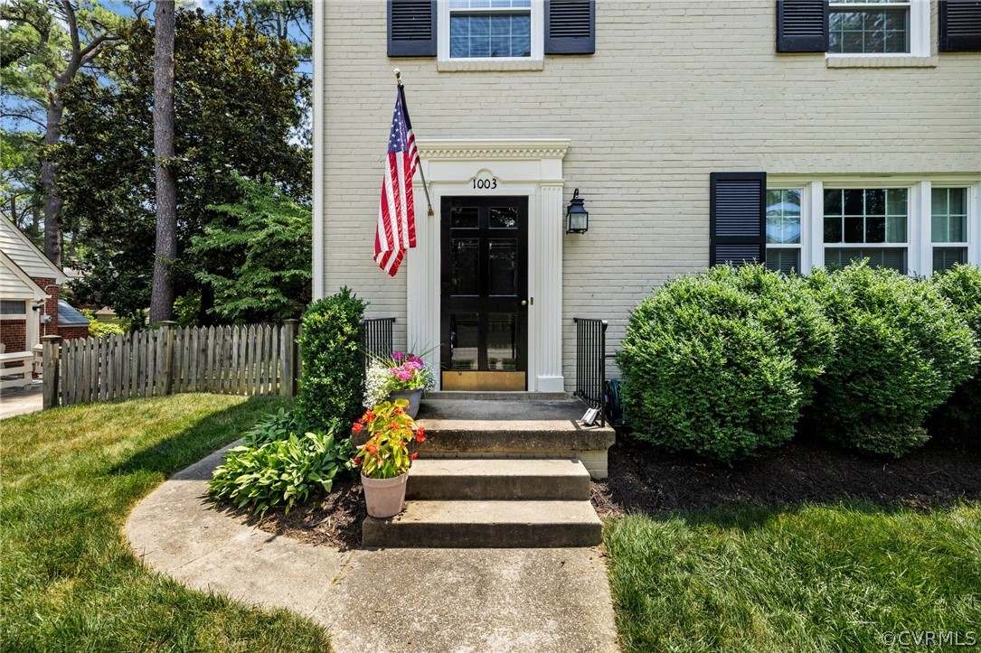 1003 Bevridge Road Richmond, VA 23226 - Photo 4 of 29 a front view of a house with plants and garden