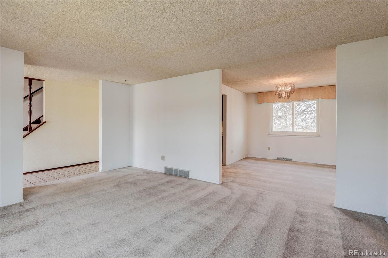 806 Cole Street Golden, CO 80401 - Photo 15 of 36 a view of an empty room with a window