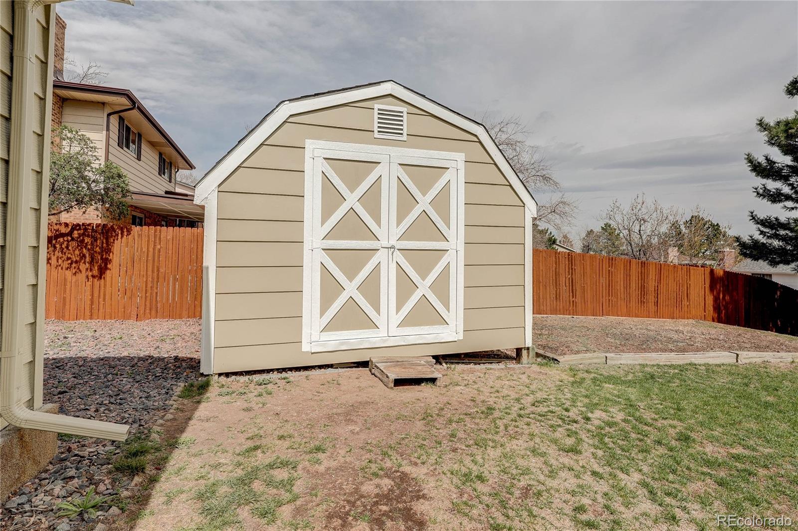 806 Cole Street Golden, CO 80401 - Photo 29 of 36 a front view of a house with a yard