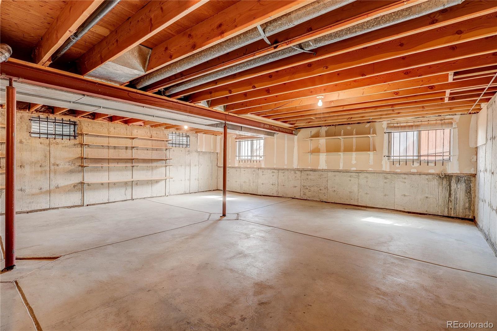 806 Cole Street Golden, CO 80401 - Photo 32 of 36 a view of an empty room with a window