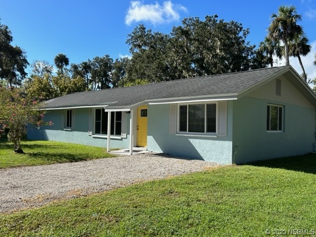 795 Biro Drive Port Orange, FL 32129 - Photo 1 of 26 a front view of house with yard and green space