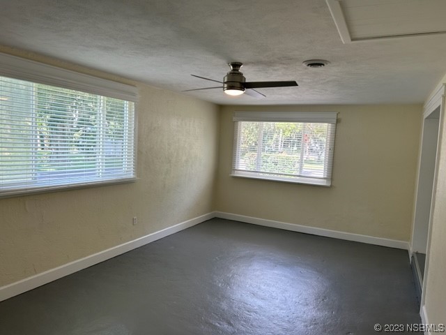 795 Biro Drive Port Orange, FL 32129 - Photo 12 of 26 a view of an empty room with a window